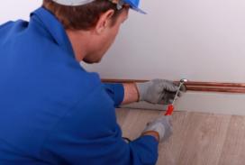 Citrus Heights plumbing professional works on copper pipes