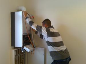 Water heater repair specialist in Citrus Heights works on a tankless